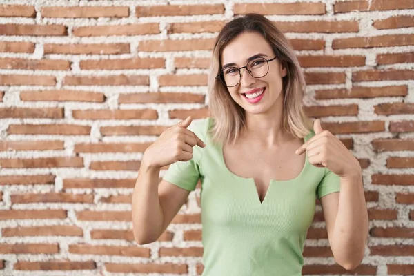 Young Beautiful Woman Standing Bricks Wall Looking Confident Smile Face — Fotografie, imagine de stoc