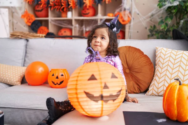Adorable Hispanic Toddler Having Halloween Party Holding Pumpkin Toy Home — Fotografia de Stock