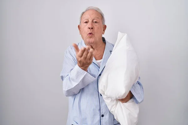 Senior Man Grey Hair Wearing Pijama Hugging Pillow Looking Camera — Zdjęcie stockowe