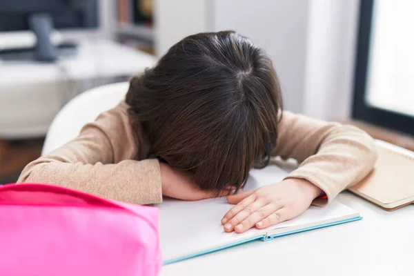 Adorable Hispanic Girl Student Stressed Leaning Book Classroom — Stockfoto