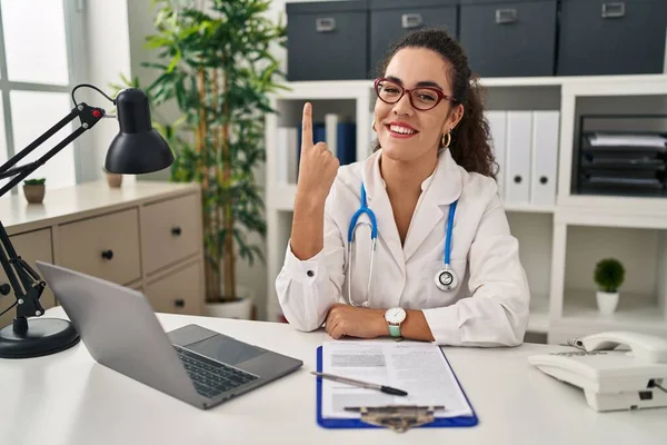 Young Hispanic Woman Wearing Doctor Uniform Stethoscope Pointing Finger Successful — Stock Photo, Image