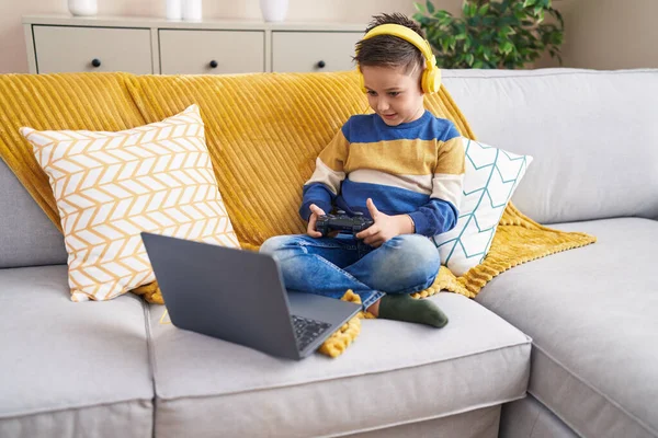 Adorable Hispanic Boy Playing Video Game Sitting Sofa Home — Stok fotoğraf