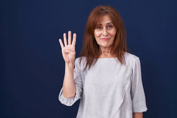 Middle Age Woman Standing Blue Background Showing Pointing Fingers Number —  Fotos de Stock