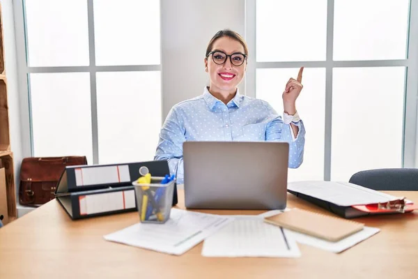 Young Hispanic Woman Working Office Wearing Glasses Smiling Happy Pointing — 图库照片