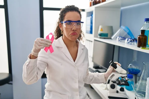 Young Hispanic Woman Working Scientist Laboratory Looking Breast Cancer Cure — Stockfoto