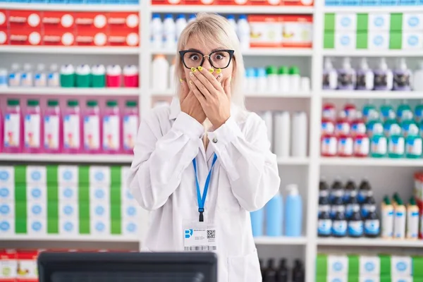 Young Caucasian Woman Working Pharmacy Drugstore Shocked Covering Mouth Hands — Stockfoto