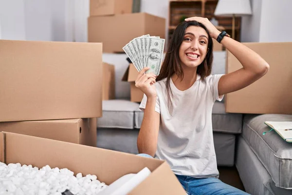 Young Beautiful Woman Sitting Floor New Home Holding Money Stressed — Foto de Stock