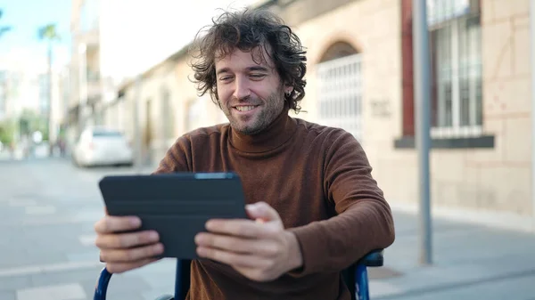 Young Hispanic Man Using Touchpad Sitting Wheelchair Street — Foto Stock