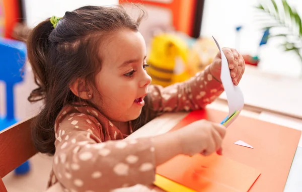 Adorable Hispanic Girl Student Sitting Table Cutting Paper Kindergarten — Stock Photo, Image