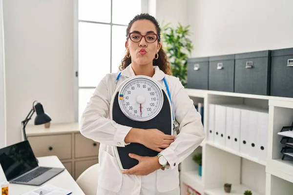 Young Hispanic Woman Working Dietitian Clinic Looking Camera Blowing Kiss — Stock Photo, Image