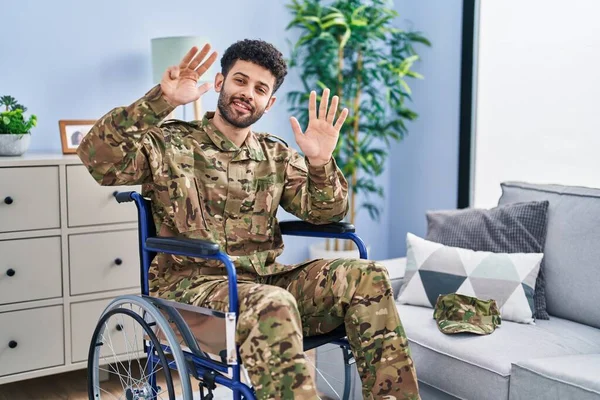 Arab Man Wearing Camouflage Army Uniform Sitting Wheelchair Showing Pointing — Stock Photo, Image