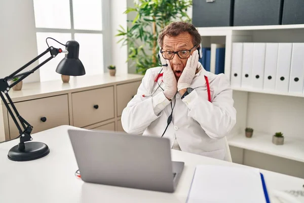 Senior Doctor Man Working Online Appointment Afraid Shocked Surprise Amazed — Stock Photo, Image