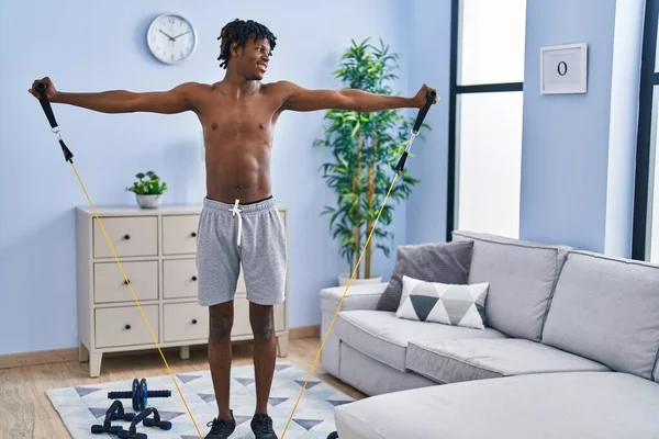 African American Man Smiling Confident Training Arms Exercise Using Elastic — Stockfoto