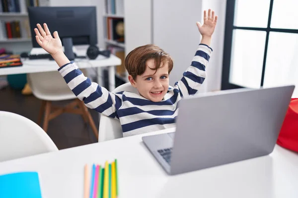 Adorable Hispanic Boy Student Using Laptop Cheerful Expression Classroom —  Fotos de Stock