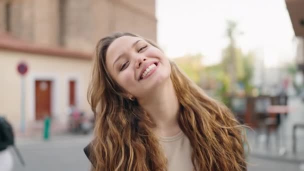 Young Hispanic Woman Smiling Confident Kissing Street — Vídeos de Stock
