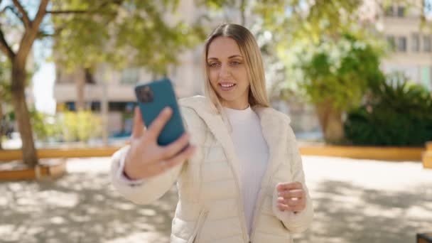 Young Woman Smiling Confident Making Selfie Smartphone Park — Stockvideo