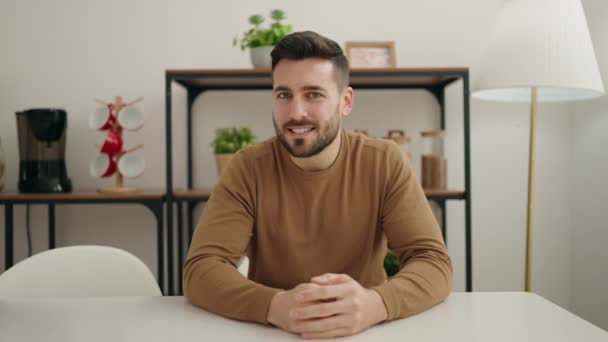 Young Hispanic Man Sitting Table Speaking Home — Stock videók