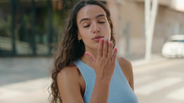 Young Beautiful Hispanic Woman Smiling Confident Doing Kiss Gesture Hand — Stock video