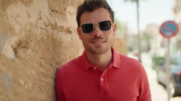 Young Hispanic Man Smiling Confident Wearing Sunglasses Street — Vídeos de Stock