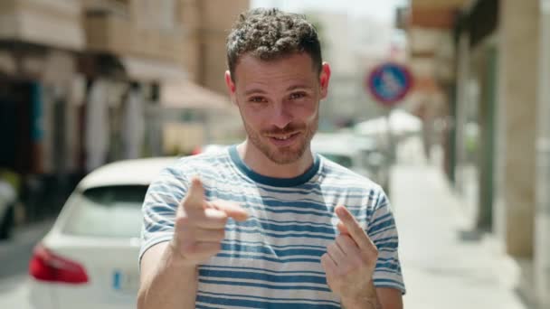 Young Hispanic Man Smiling Confident Doing Coming Gesture Hand Street — Vídeos de Stock