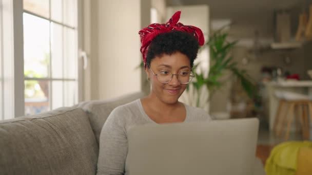 African American Woman Using Laptop Sitting Sofa Home — стоковое видео