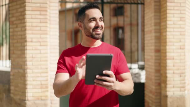 Young Hispanic Man Smiling Confident Using Touchpad Street — Wideo stockowe