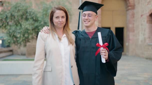 Man Woman Mother Son Hugging Each Other Celebrating Graduation University — Wideo stockowe