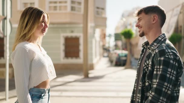 Young Couple Smiling Confident Standing Hands Together Street — Video Stock