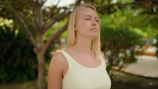 Young Blonde Woman Breathing Park — Vídeos de Stock