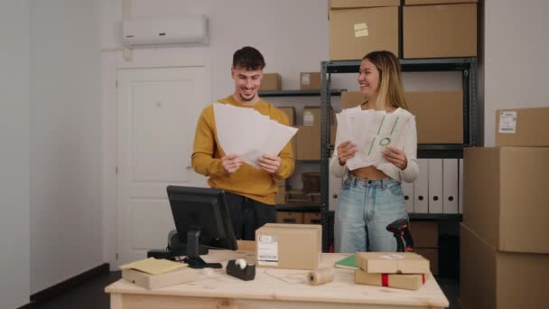Young Couple Ecommerce Business Workers Throwing Paperworks Office — Stock Video