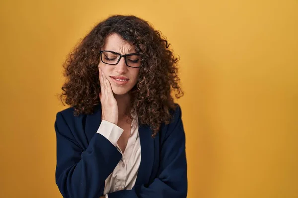 Hispanic Woman Curly Hair Standing Yellow Background Touching Mouth Hand —  Fotos de Stock