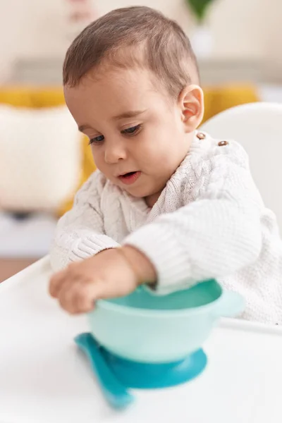 Adorable Hispanic Toddler Sitting Highchair Relaxed Expression Home — Stock Photo, Image