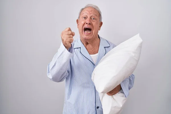 Senior Man Grey Hair Wearing Pijama Hugging Pillow Angry Mad — Zdjęcie stockowe