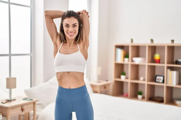 Young Beautiful Hispanic Woman Smiling Confident Stretching Arm Bedroom — ストック写真