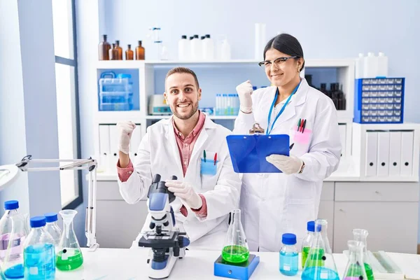 Two Young People Working Scientist Laboratory Screaming Proud Celebrating Victory — Stock Photo, Image