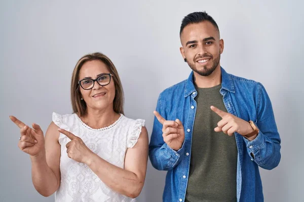 Hispanic Mother Son Standing Together Smiling Looking Camera Pointing Two — Fotografia de Stock