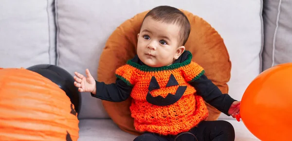 Adorable Hispanic Baby Having Halloween Party Sitting Sofa Home — Foto de Stock