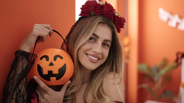 Young Blonde Woman Wearing Katrina Costume Holding Pumpkin Basket Home — Stok fotoğraf
