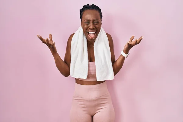 Beautiful Black Woman Wearing Sportswear Towel Pink Background Celebrating Mad — Fotografia de Stock
