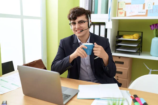 Non Binary Man Call Center Agent Drinking Coffee Working Office — Stockfoto