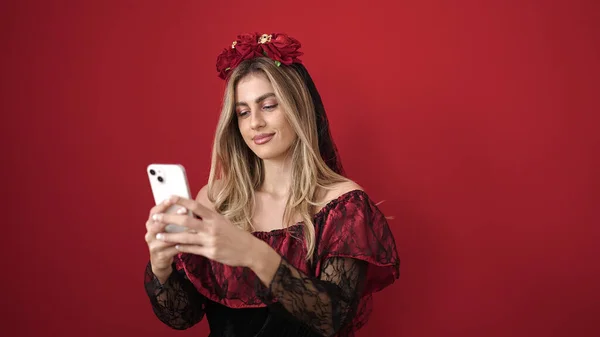Young Blonde Woman Using Smartphone Having Halloween Party Isolated Red — Stock Photo, Image