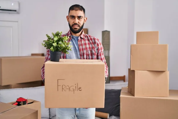 Middle East Man Beard Moving New Home Holding Cardboard Box — Stock fotografie