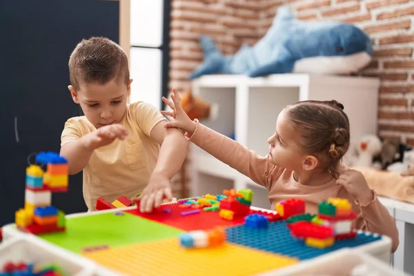 Two Kids Playing Construction Blocks Sitting Table Kindergarten — 스톡 사진