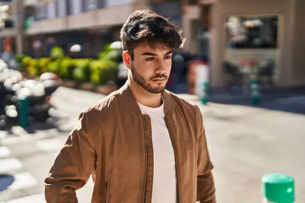 Young Hispanic Man Relaxed Expression Standing Street — Stockfoto