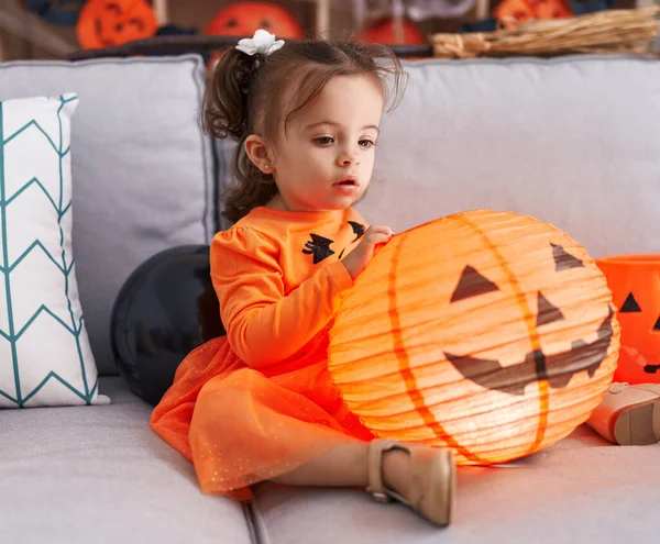 Adorable Hispanic Toddler Having Halloween Party Holding Pumpkin Toy Home — Stockfoto