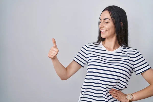 Young Brunette Woman Wearing Striped Shirt Looking Proud Smiling Doing — Stok fotoğraf