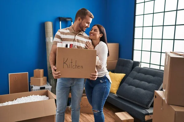 Man Woman Couple Hugging Each Other Holding Kitchen Package Standing — Fotografia de Stock