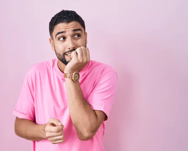Hispanic Young Man Standing Pink Background Looking Stressed Nervous Hands — Foto Stock