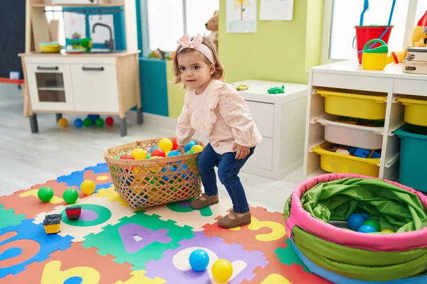 Adorable Blonde Toddler Playing Balls Sitting Floor Kindergarten — Stock Photo, Image