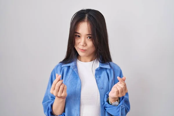 Young Chinese Woman Standing White Background Doing Money Gesture Hands — Foto de Stock